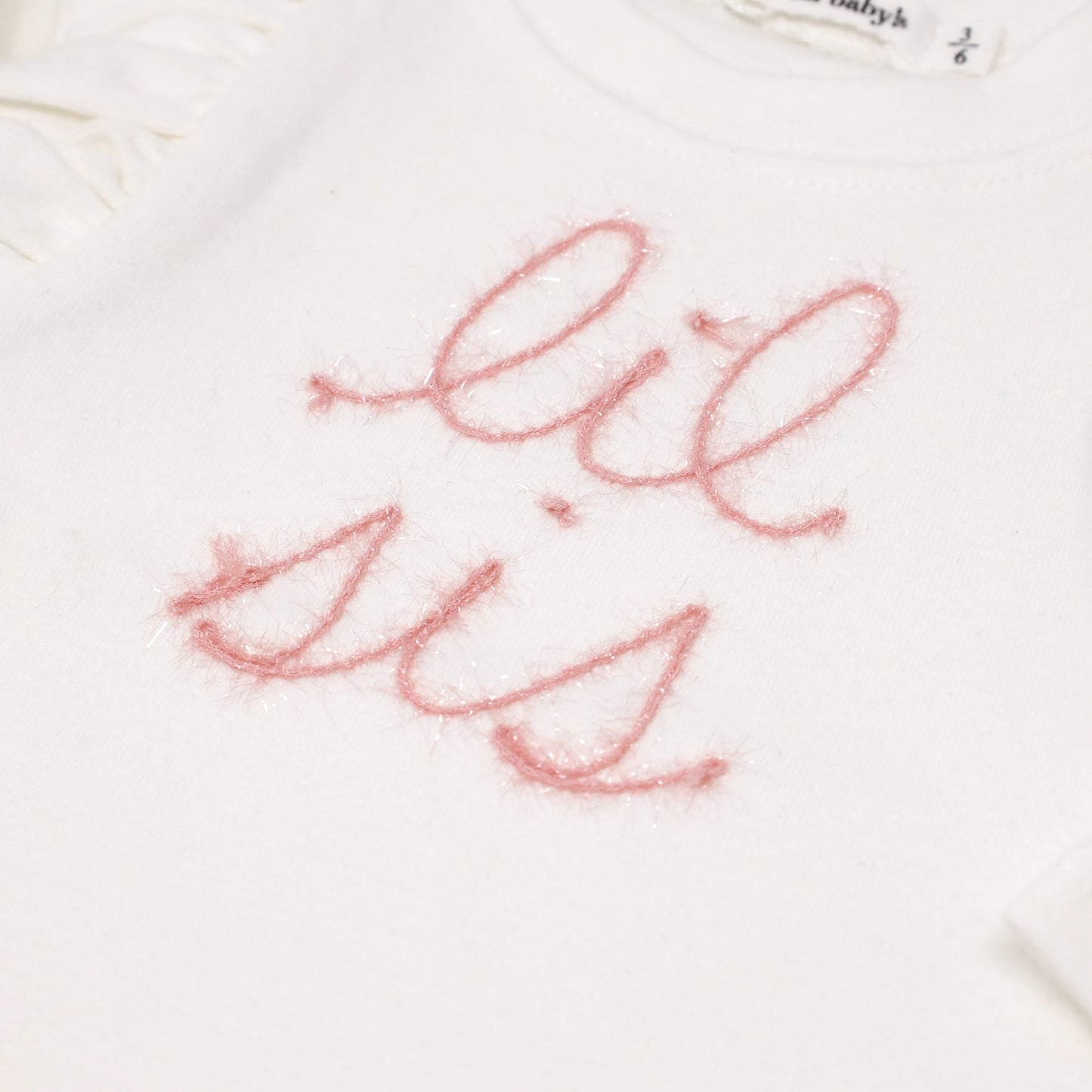 "lil sis" Pink Eyelash Millie LS Tee